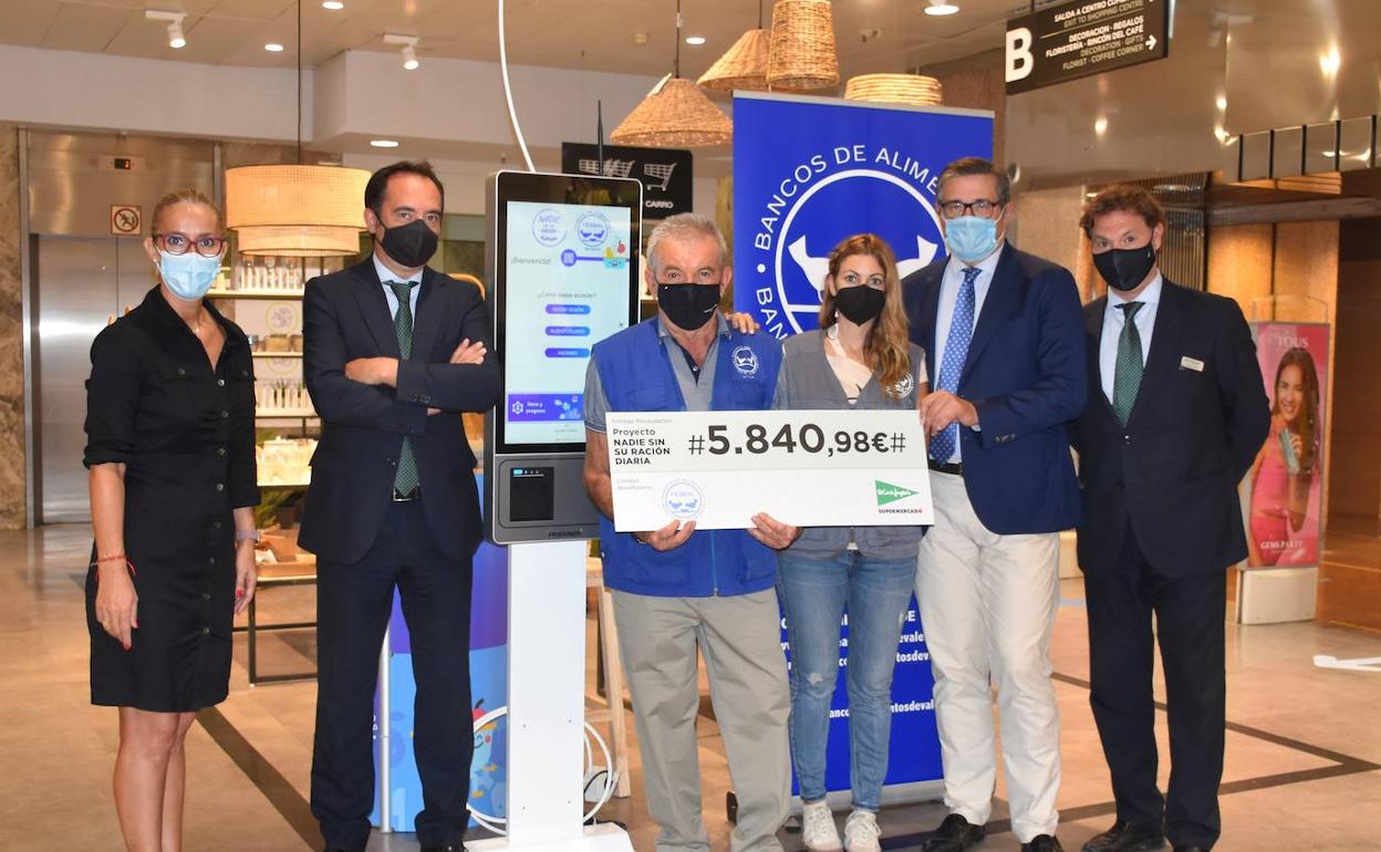 Dos Corte Inglés de Valencia donan 5.840 euros al Banco de Alimentos