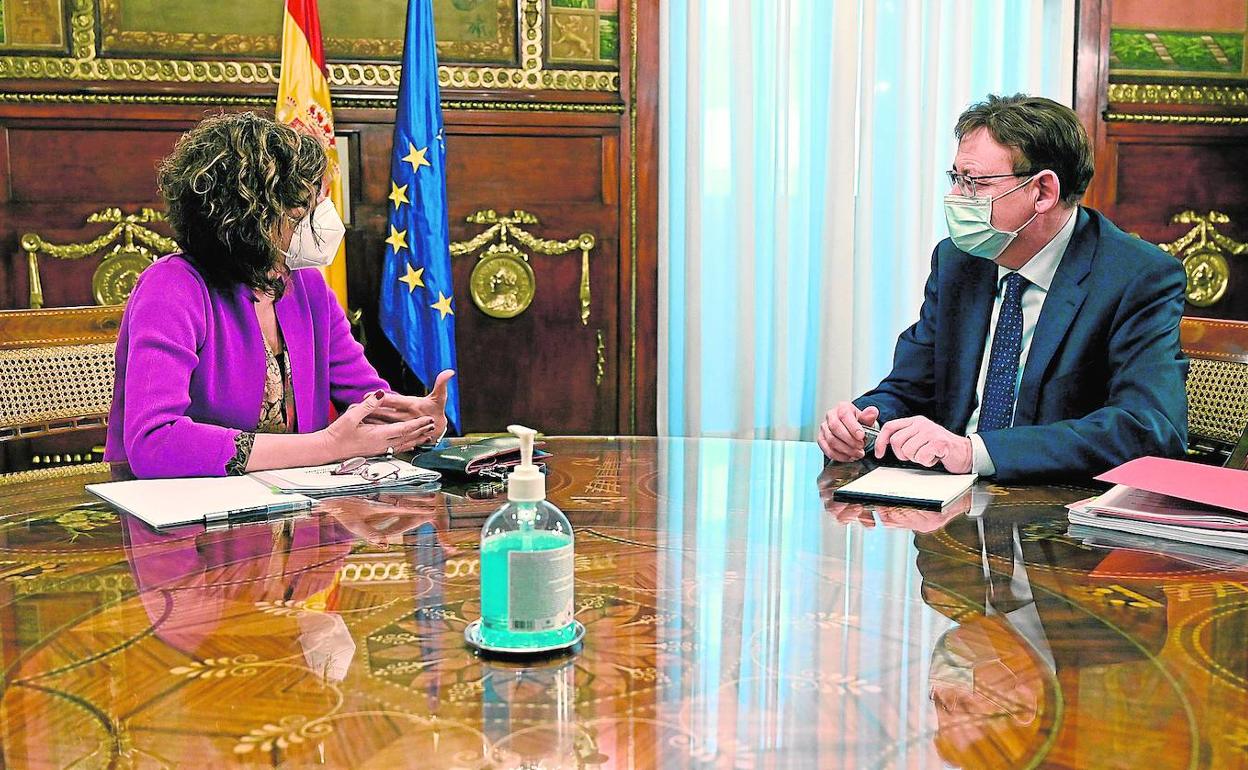 La ministra Montero y el presidente Puig, en una reunión en el ministerio. 