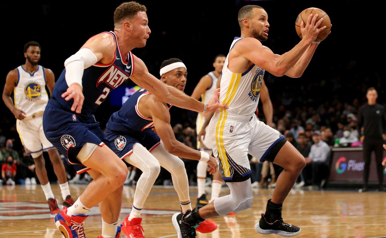 Stephen Curry (30) y Blake Griffin (2).