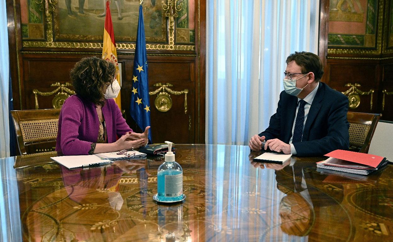 La ministra Montero y el presidente Puig, durante una reunión en Madrid. 