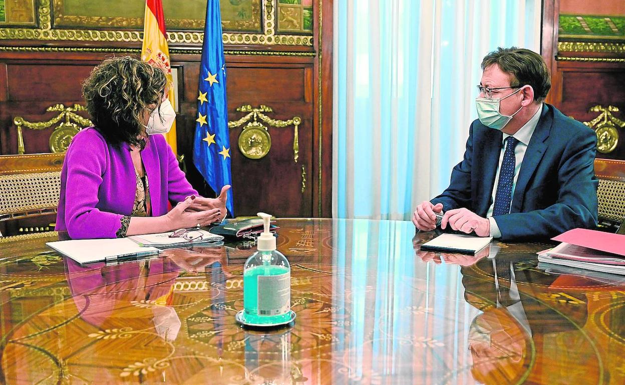 María Jesús Montero y Ximo Puig, reunidos en la sede del Ministerio de Hacienda. 