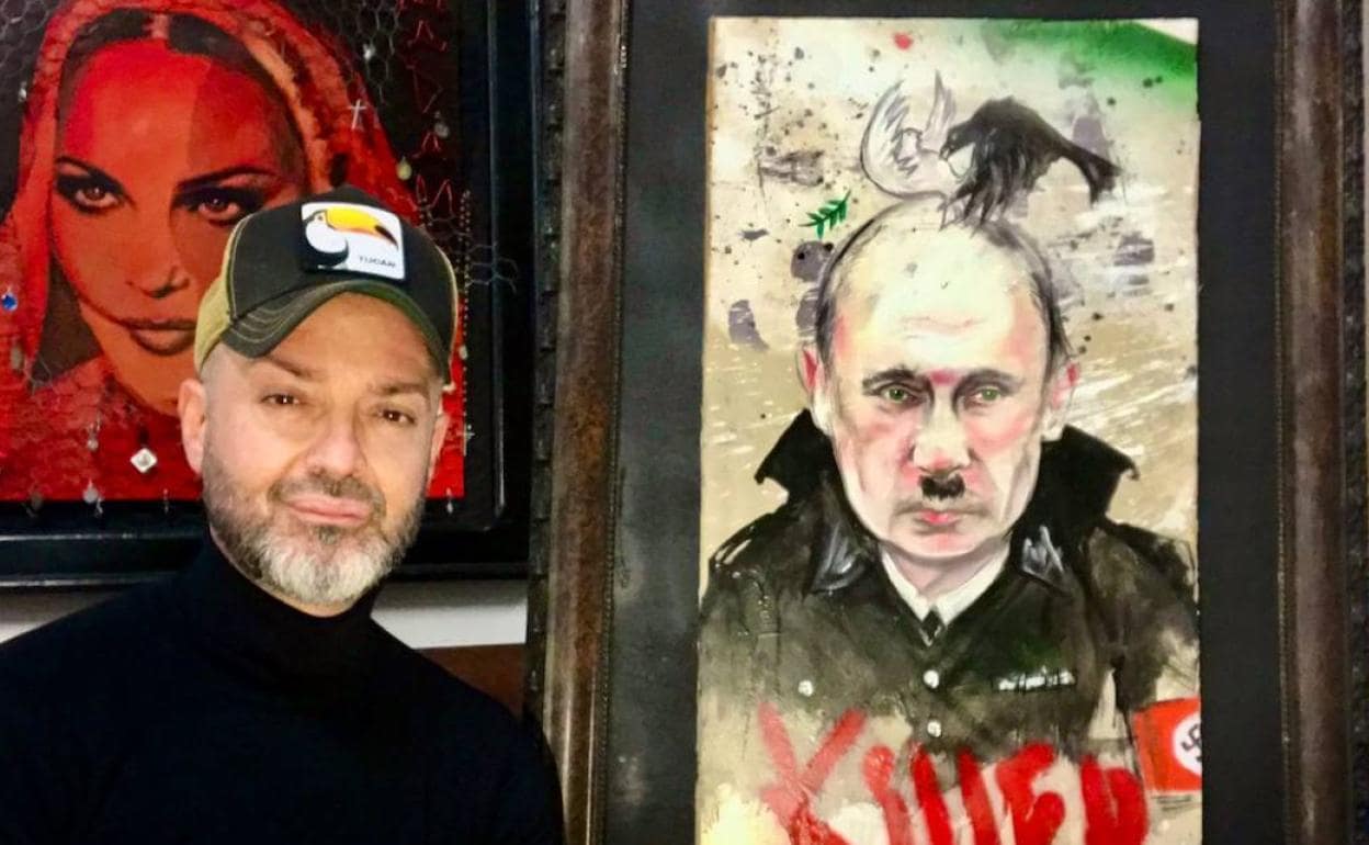 El pintor valenciano Jesús Arrúe, con la obra utilizada por Madonna para criticar a Putin. 