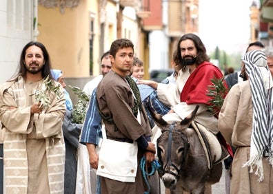 Imagen secundaria 1 - Una imágenes del Pregón y el Domingo de Ramos. 