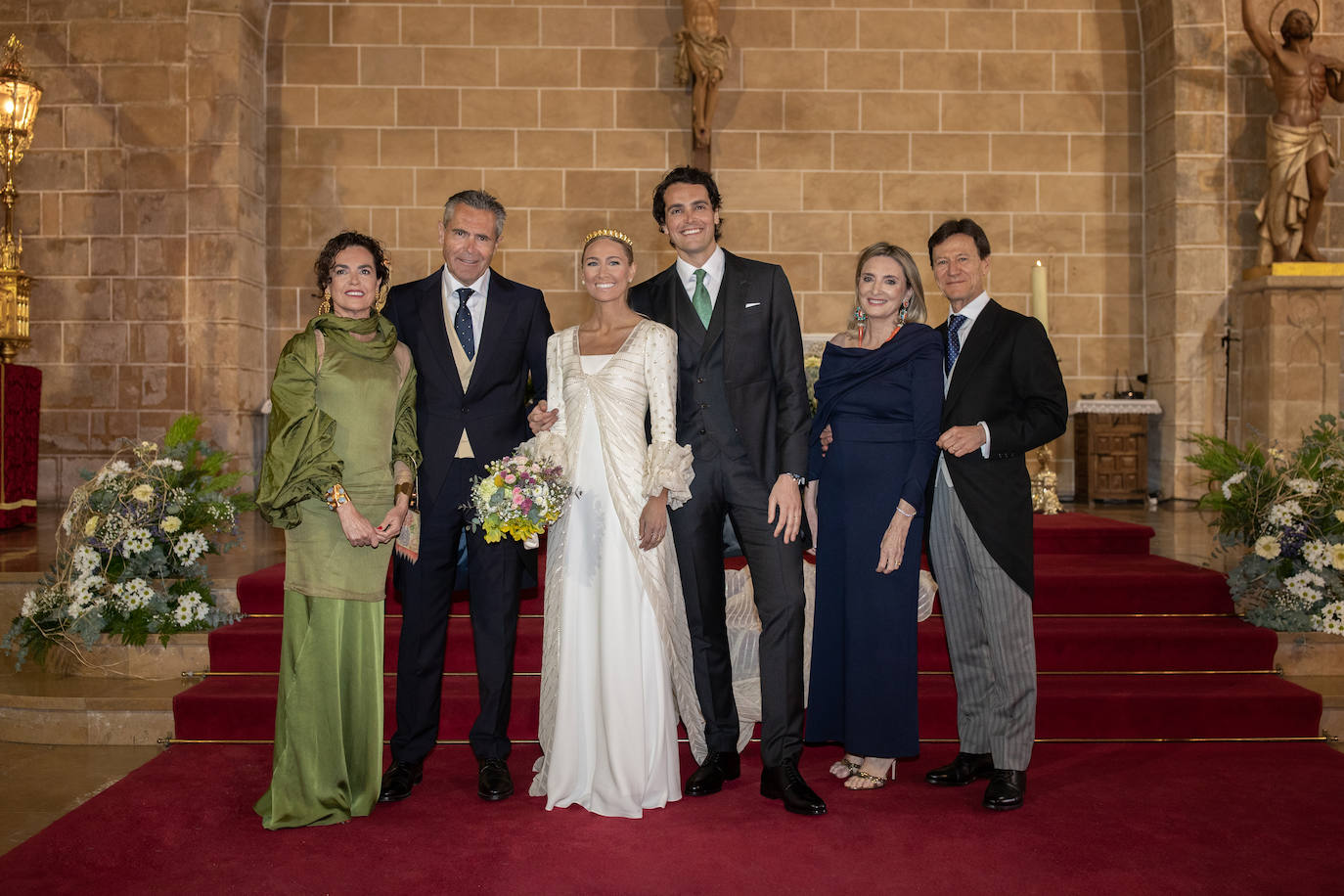 Silvia Juanes Martínez y Borja Colomer Prado con sus padres, Lorenzo y Silvia y Javier y Belén. 