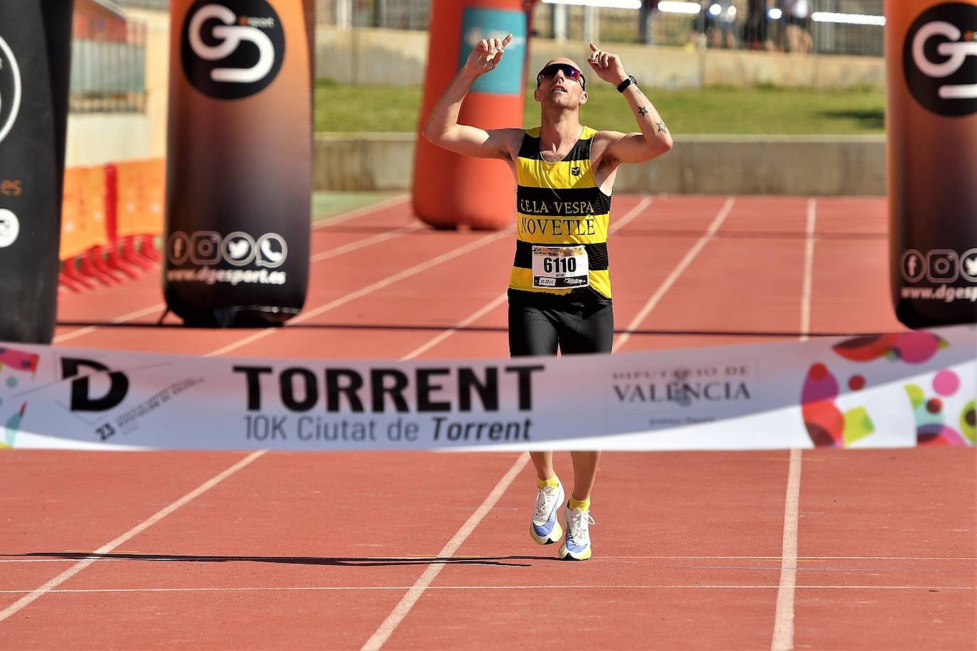 Fotos: Búscate en la 10k y la Media Maratón de Torrent