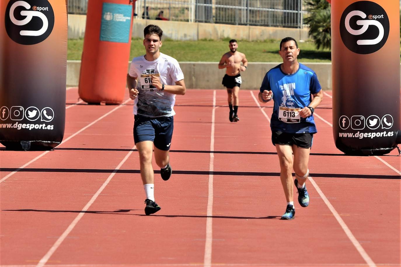 Fotos: Búscate en la 10k y la Media Maratón de Torrent