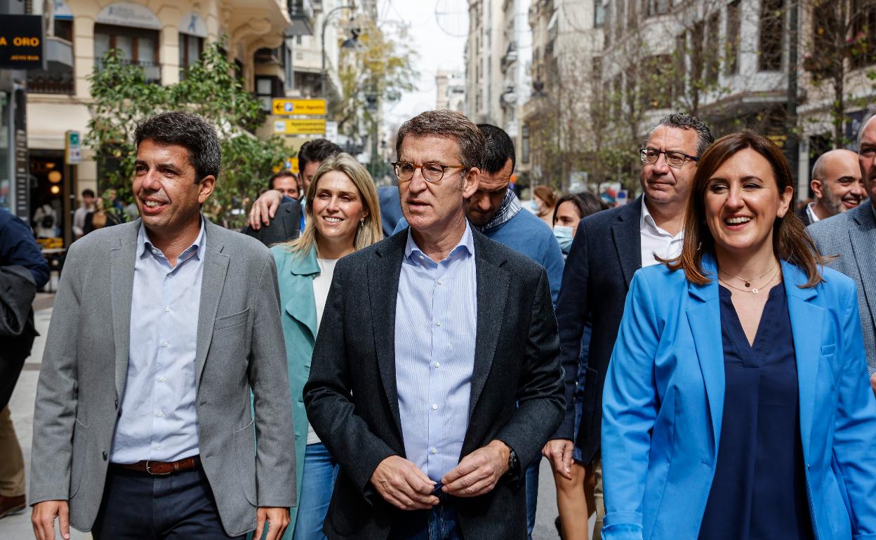 Núñez Feijóo, entre Mazón y Catalá, en Valencia. 