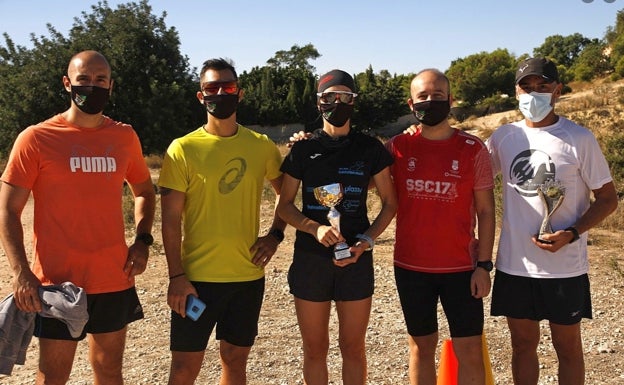Algunos de los componentes del club, en una carrera reciente tras la pandemia.  MURZI RUNNERS