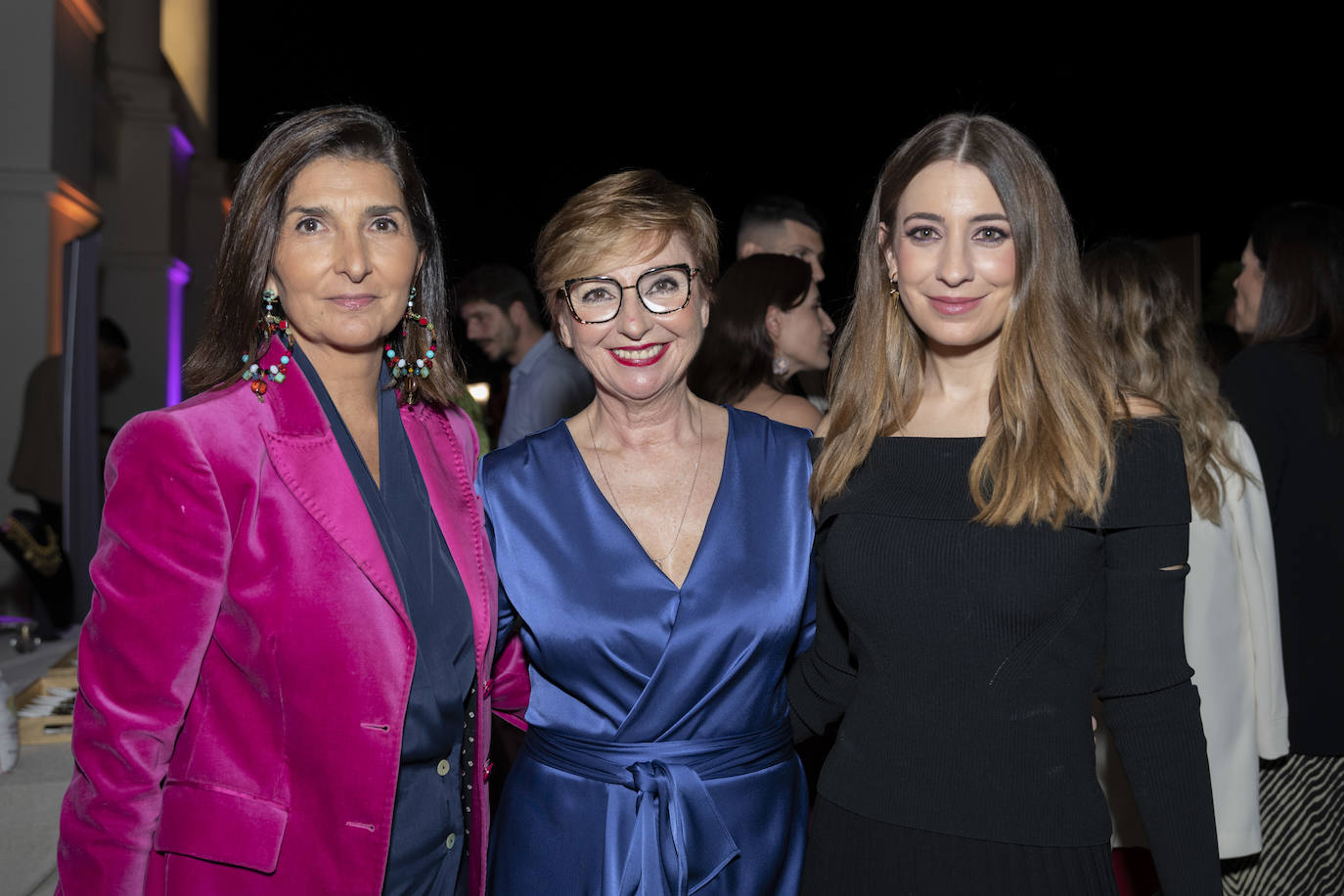 Isabel Cosme, Isabel Sanchis y Paula Maiques, en la fiesta de inauguración de la MFW.