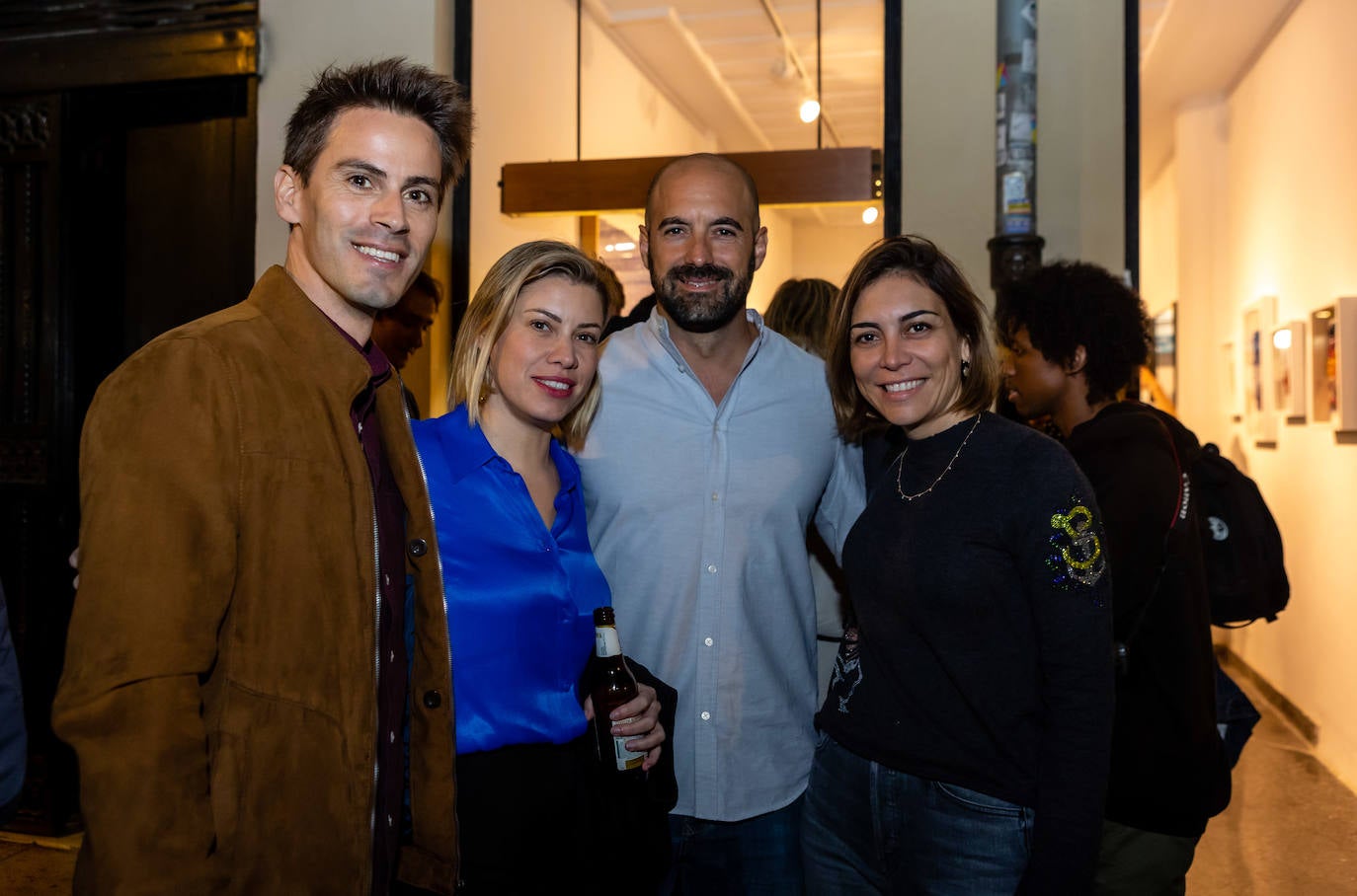 Asistentes a la exposición de la Mercería.