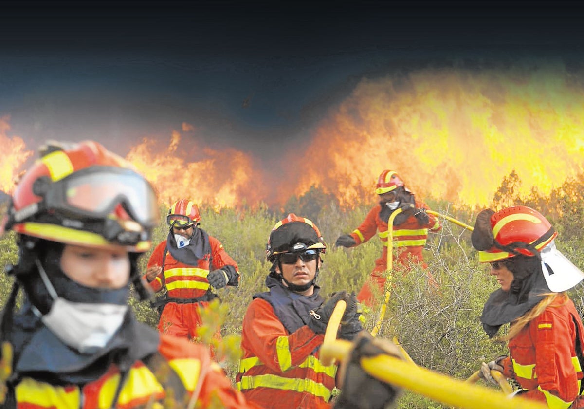 Miembros de la Unidad Militar de Emergencias luchan contra el fuego en Llutxent. ::