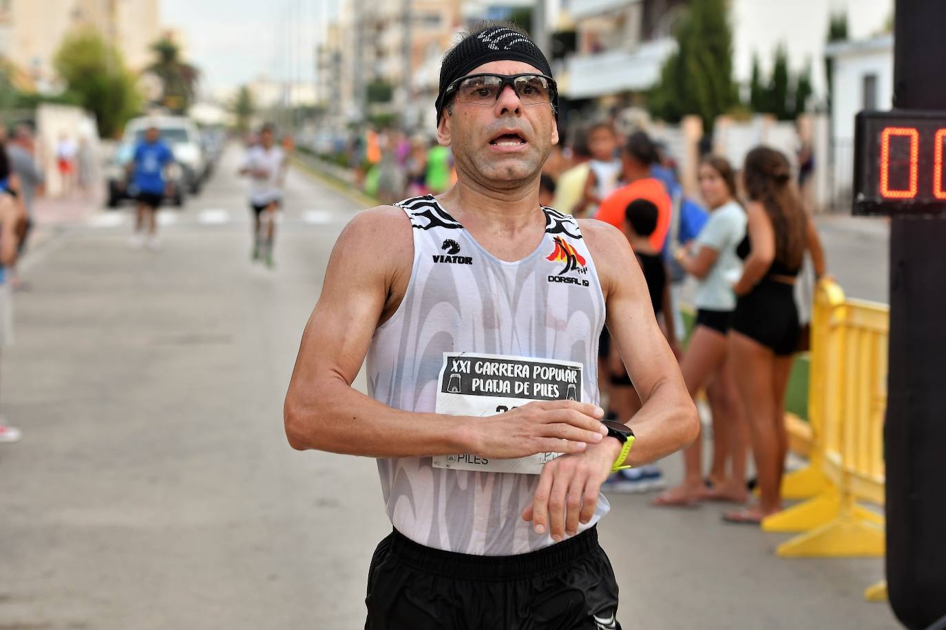 Búscate en la carrera popular Playa de Piles 2023