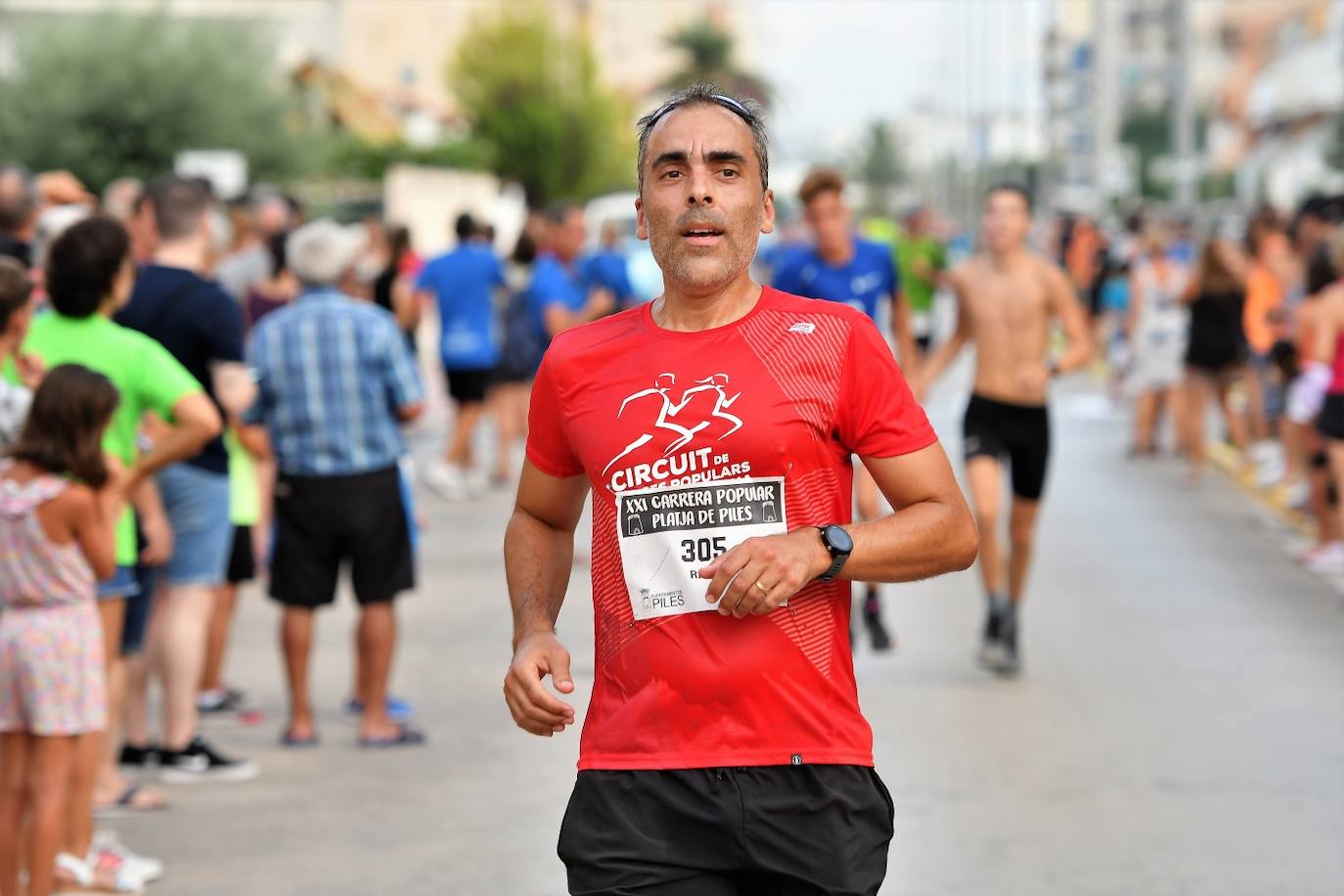 Búscate en la carrera popular Playa de Piles 2023