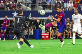 Ferran y Courtois, en un partido de pretemporada.