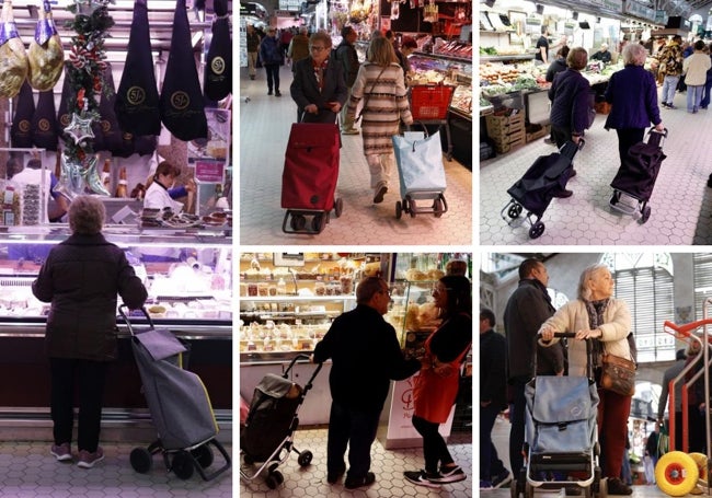 Varios compradores con carrito, en el Mercado Central este miércoles.