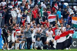 Los jugadores de Siria celebran la clasificación.