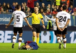 Jaime Latre y Paulista, en un partido del Valencia.