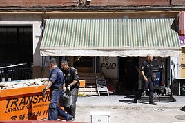 La Policía finaliza la búsqueda del cadaver de una mujer en un bajo de Valencia sin encontrarlo