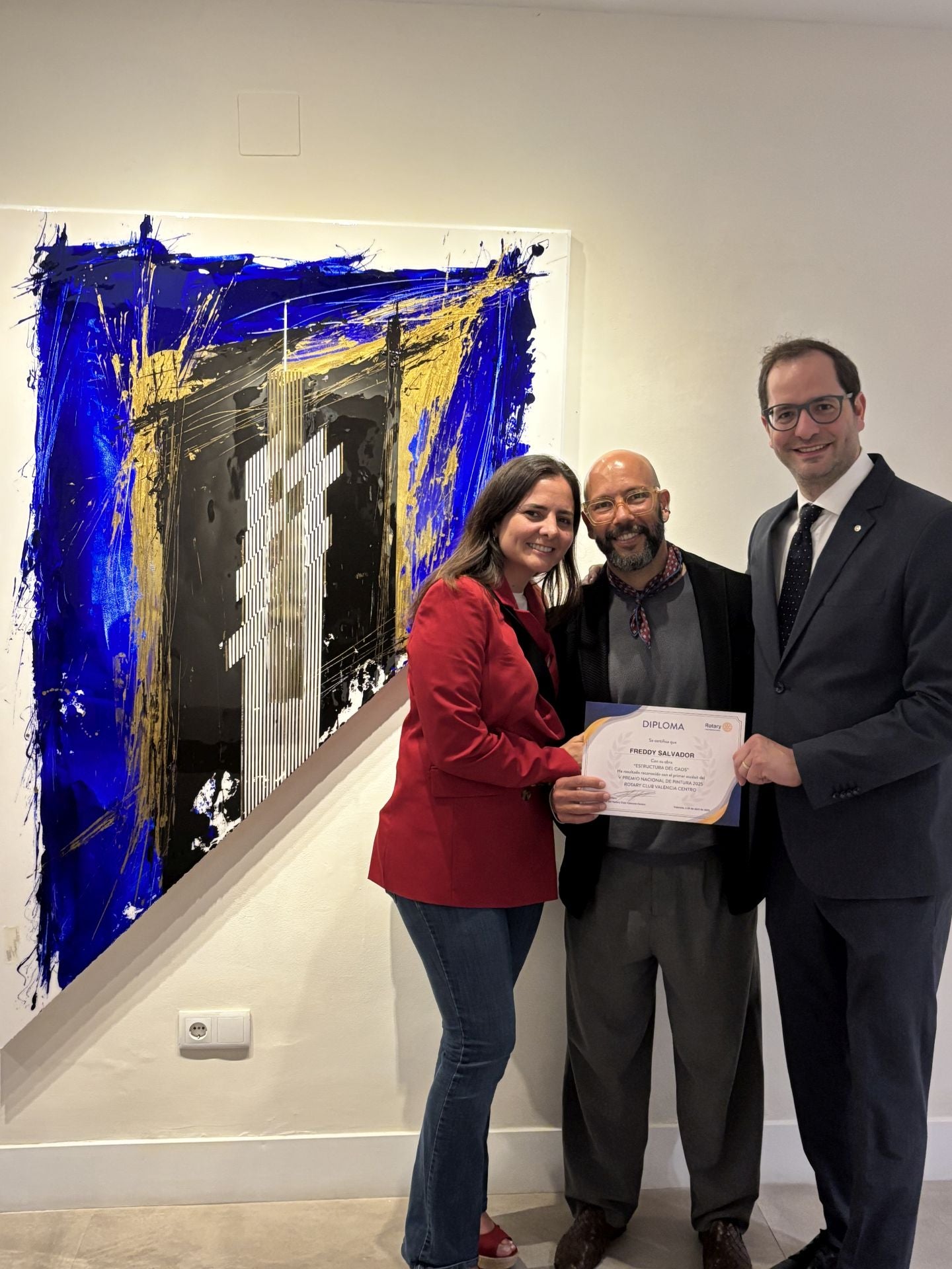Erika Duarte, CEO de Inlogiq, Freddy Salvador, primer accésit y Miguel Quintero, presidente del club Rotary València Centro.