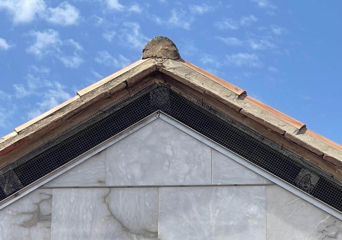 Imagen principal - Zona del hastial de la Lonja de Valencia.