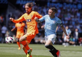 Yarek junto a Iago Aspas en un partido.