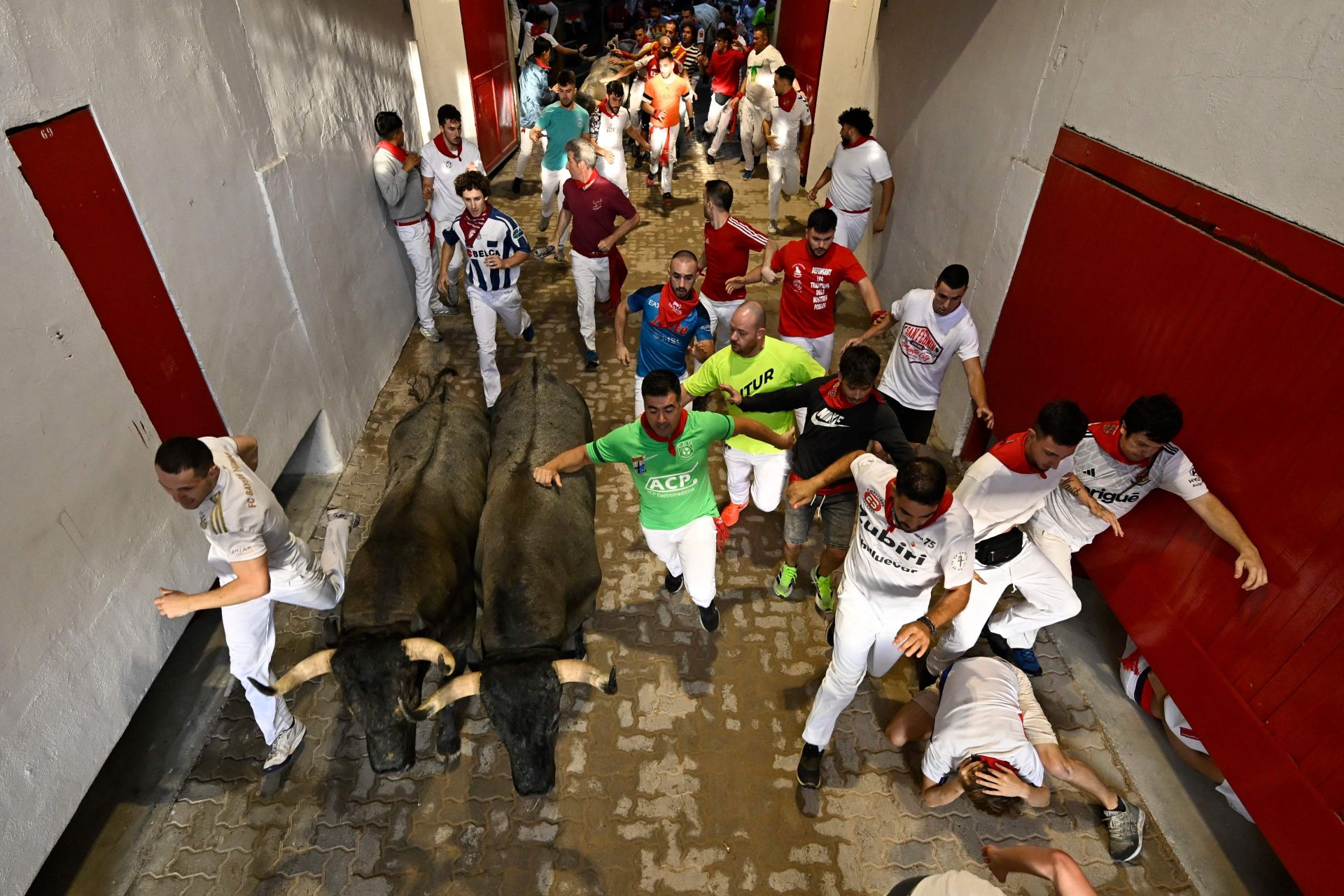 El sexto encierro de San Fermín 2025, en imágenes