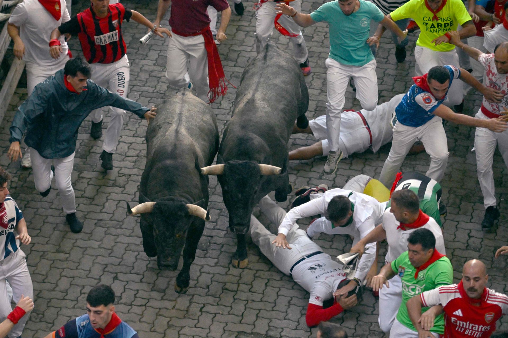 El sexto encierro de San Fermín 2025, en imágenes