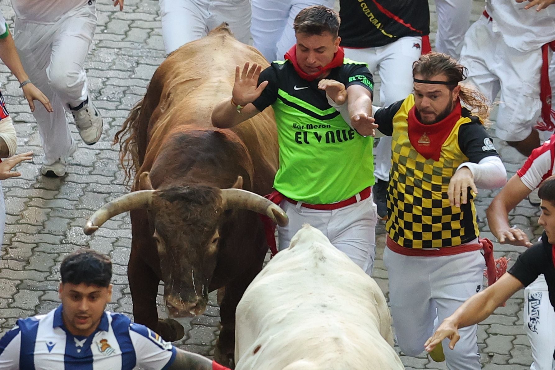 FOTOS | Séptimo encierro de San Fermín 2025