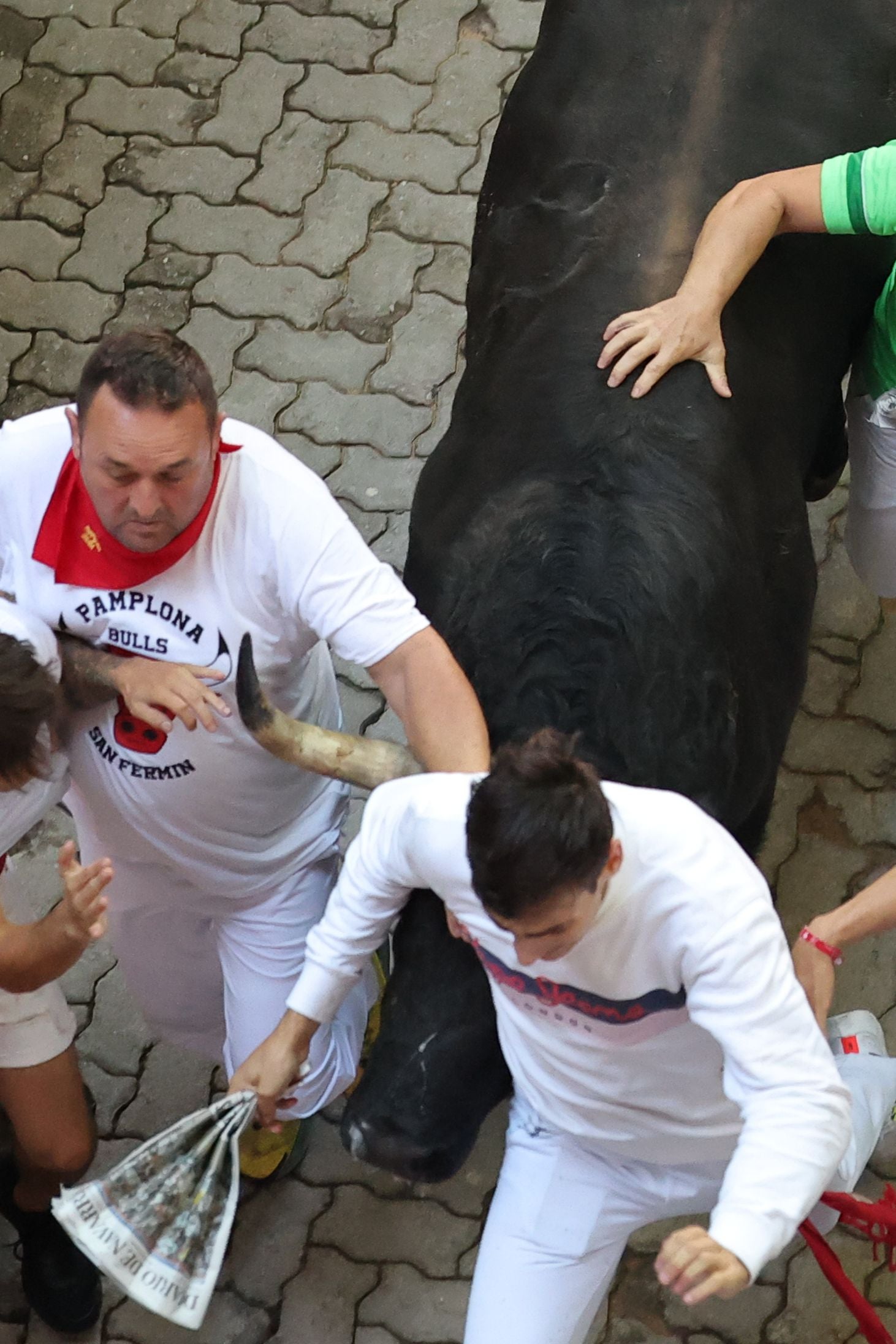 FOTOS | Séptimo encierro de San Fermín 2025