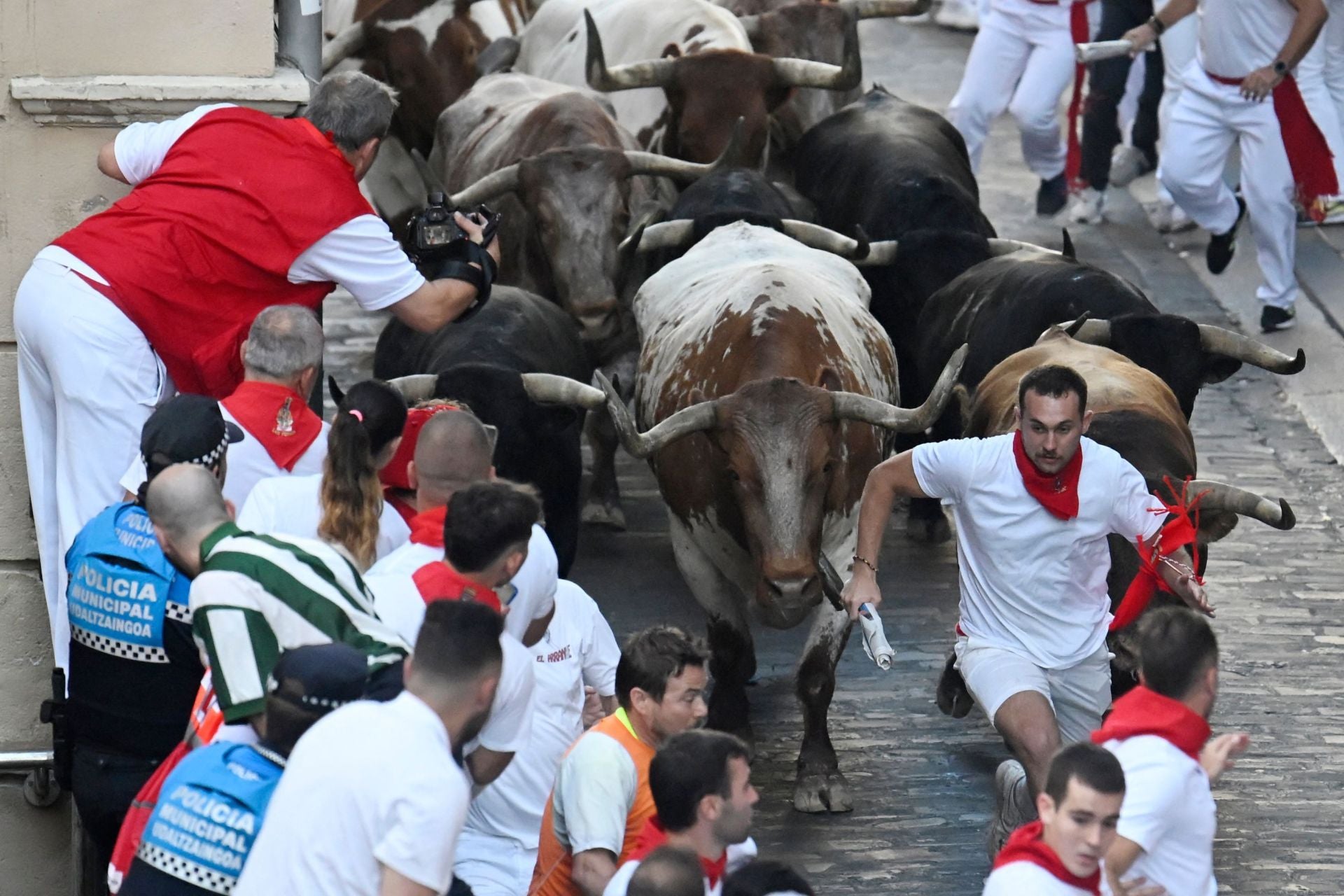 FOTOS | Séptimo encierro de San Fermín 2025