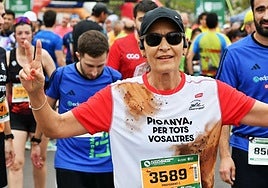 Una corredora, durante la Volta a Peu per la Discapacitat.