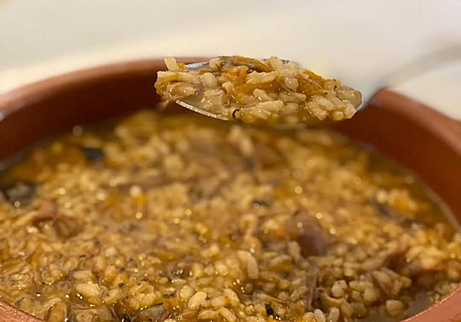 Arroz meloso de pato desmigado, boletus y foie.
