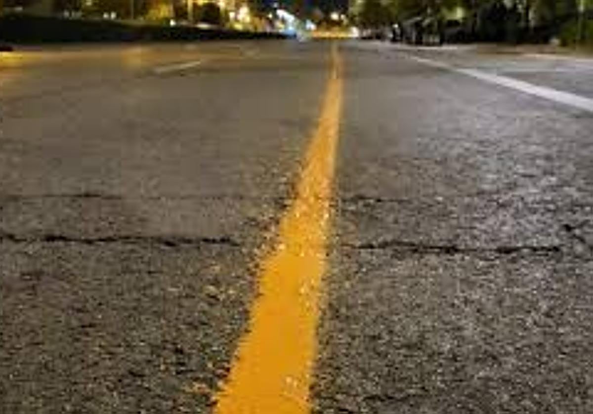 Línea naranja pintada en varias calles de Valencia.