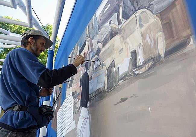 Escif, en pleno trabajo este jueves en Benetússer.