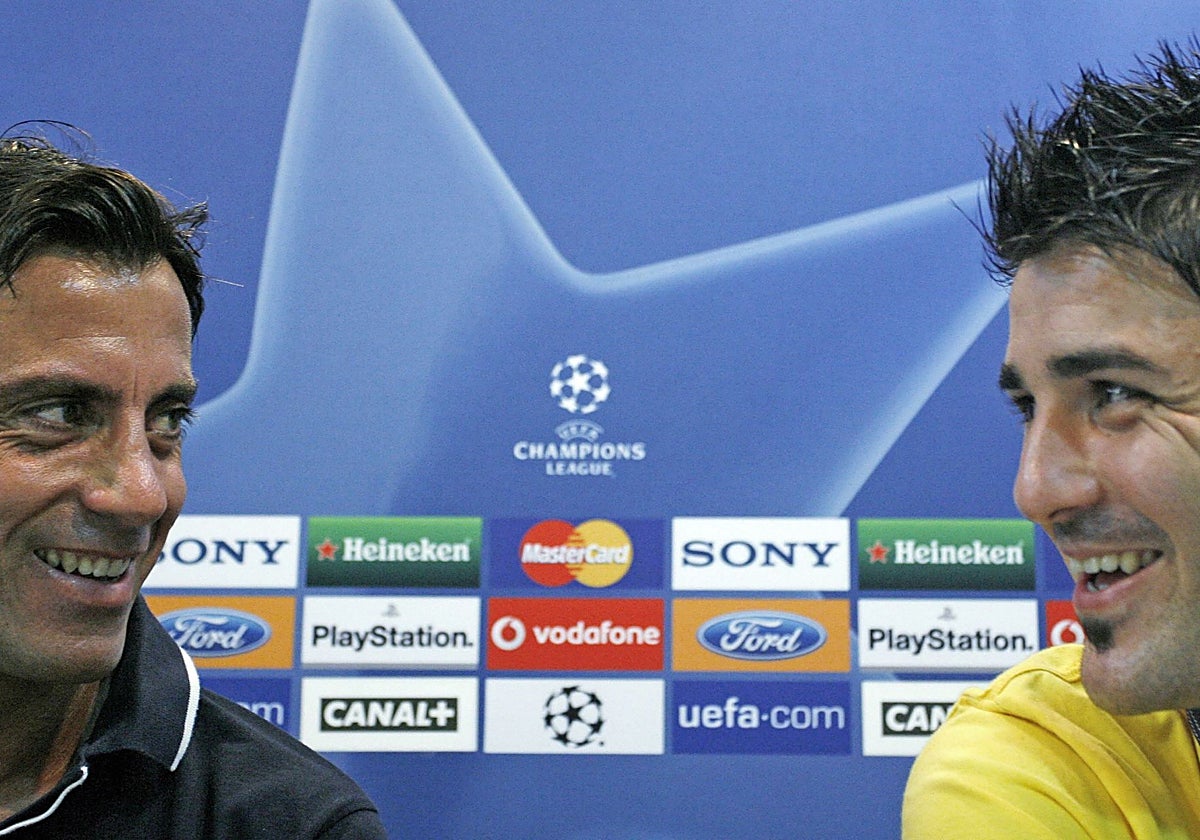 Quique Sánchez Flores y David Villa, en su época en el Valencia.