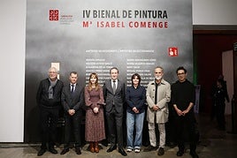 Los premiados junto a las autoridades.