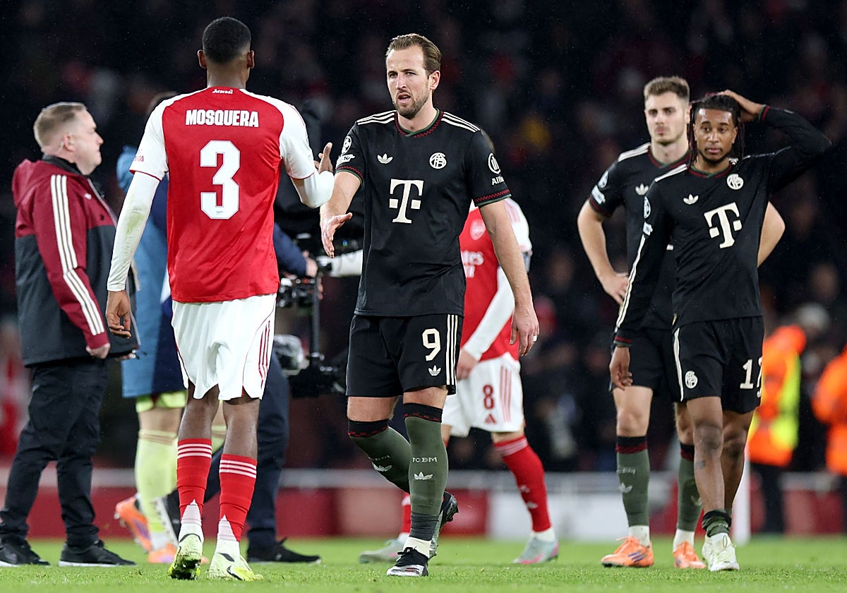 Mosquera saluda a Kane tras la victoria del Arsenal en Champions League