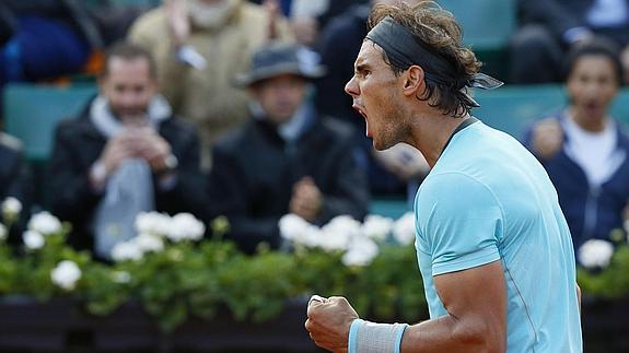 Nadal celebra un punto ante Ferrer.