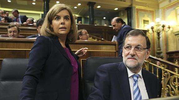 Sáenz de Santamaría y Mariano Rajoy. 