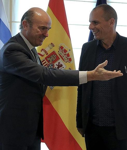 De Guindos, con Varoufakis.