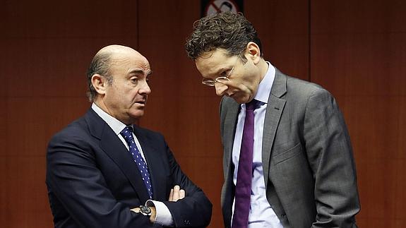 De Guindos y Dijsselbloem.