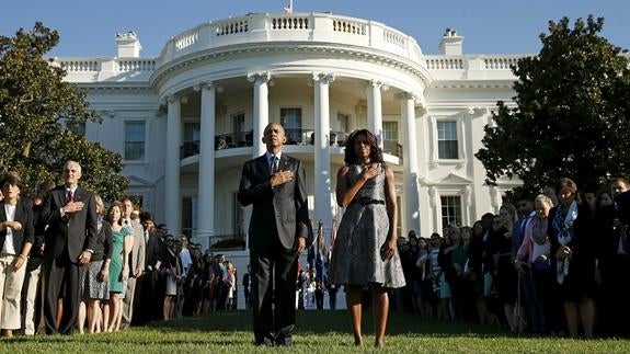 Obama y su mujer, Michelle, en el acto en la Casa Blanca.