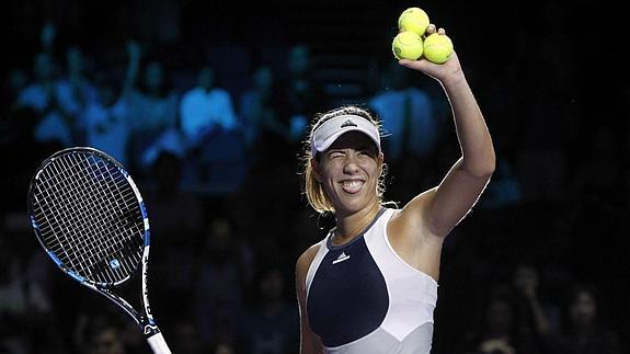 Muguruza celebra el triunfo. 