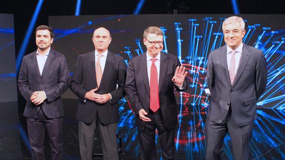 Garzón, Guindos, Sevilla y Garicano, antes del debate económico de la campaña electoral.