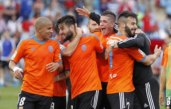 Los jugadores del Valencia celebran su clasificación para la Champions.