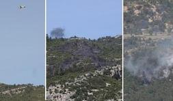 Un helicóptero sobrevuela la zona afectada, ayer. ::
JORDI MAURA