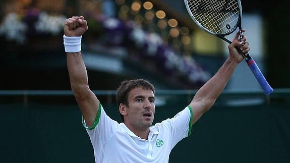 Robredo celebra su triunfo contra Janowicz. 