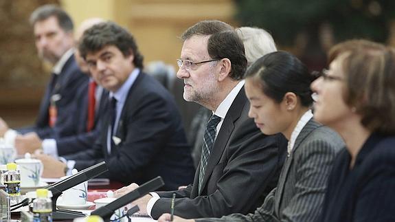 Rajoy, en China. En la foto también aparece Moragas. 