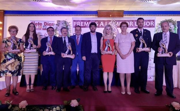 López Miras, junto a los premiados.