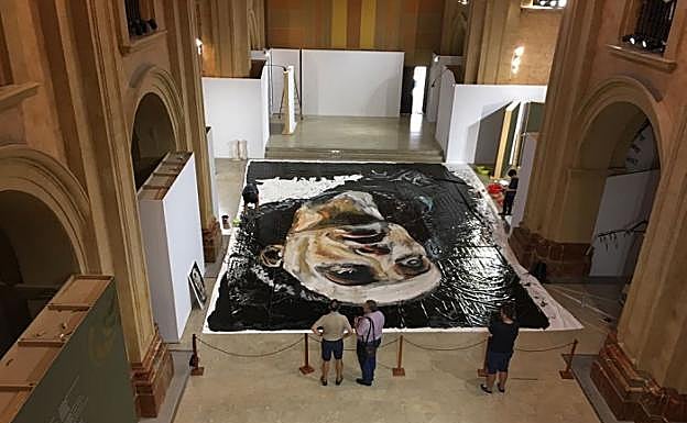 El retrato de San Juan, antes de ser instalado en el retablo de la iglesia de la Compañía. 